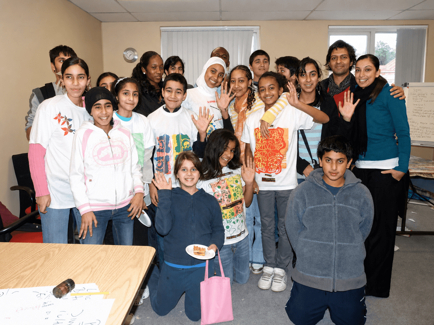 Families and teachers gathered together at a school event